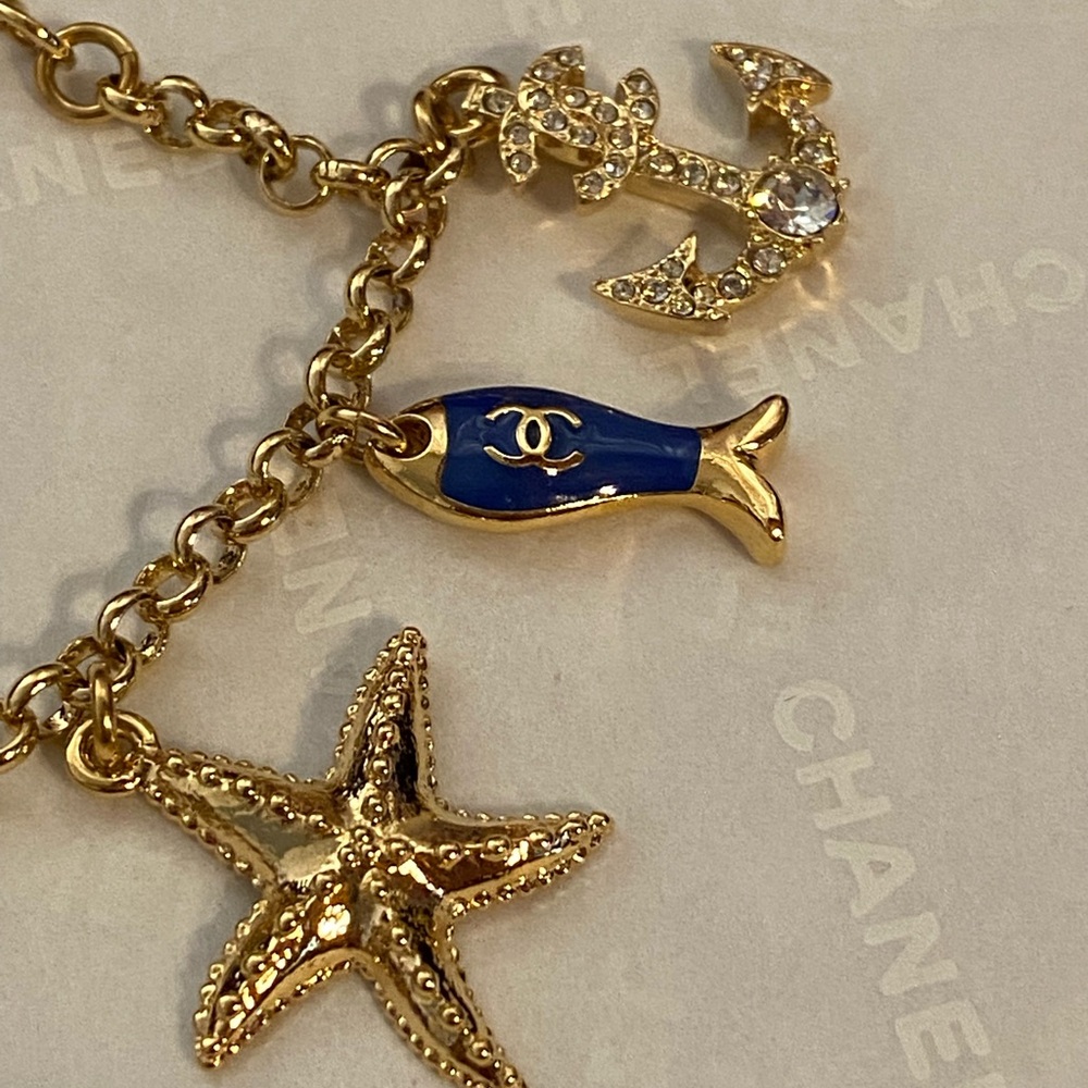 New authentic Chanel Gold and Blue Charm Bracelet - Picture 14 of 15